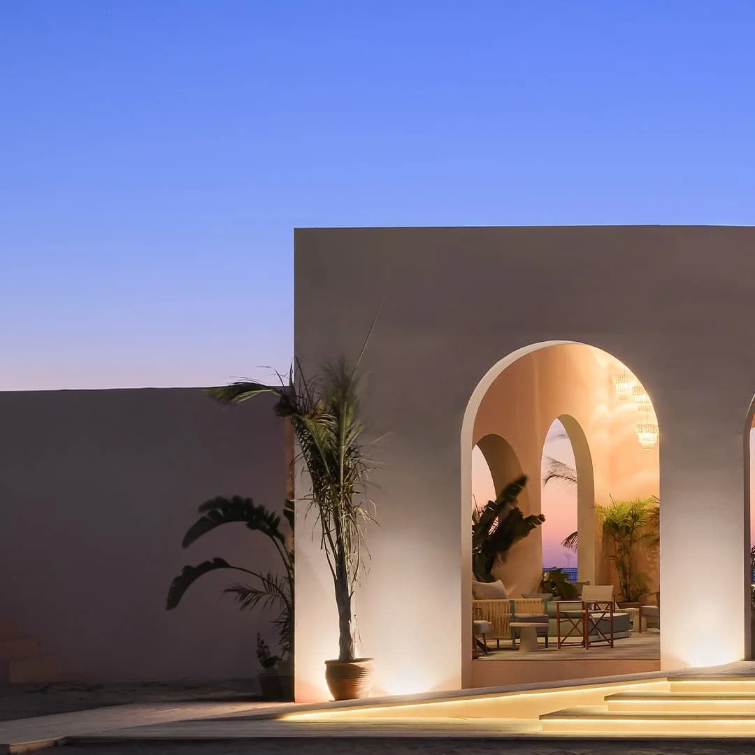 Left-hand detail of the Hacienda Heneish entrance at dusk